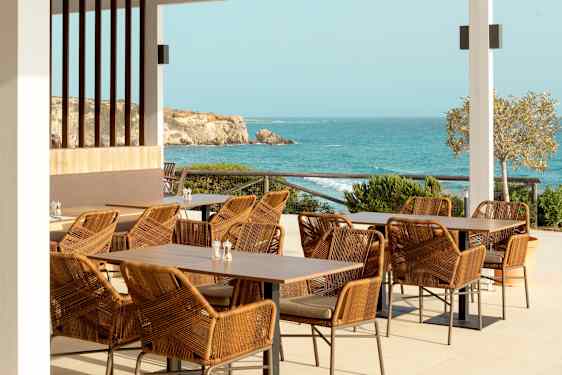 Waiter setting up table