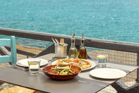 Costas's Kitchen lunchtable by the sea