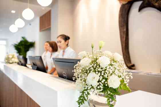 White flowers on reception desk