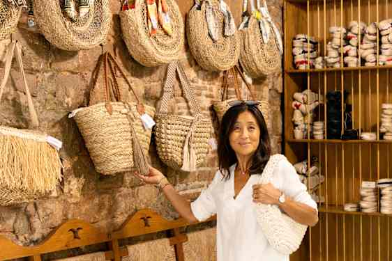 Woman in shop with bags