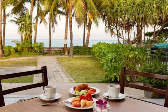 Breakfast on table by the sea