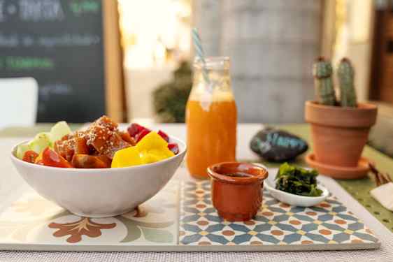 Couple at dinner table outside by the sea