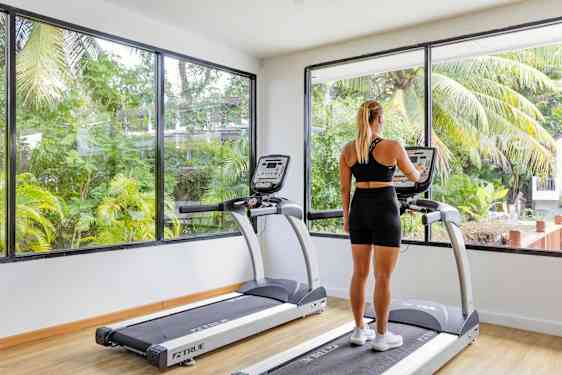 Woman on treadmill in gym