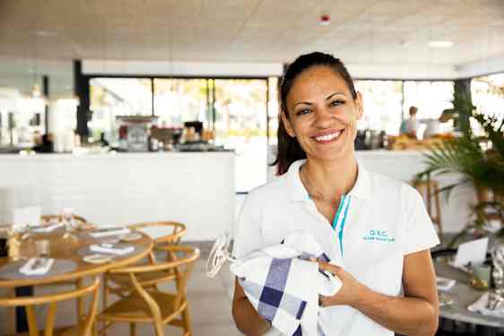 Restaurant with tables and blue chairs