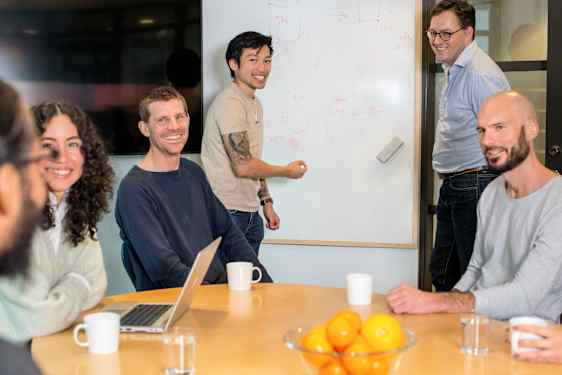Staff around a table