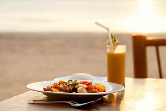 Beach restaurant in sunset