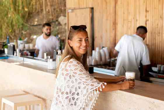 Woman relaxing at restaurant