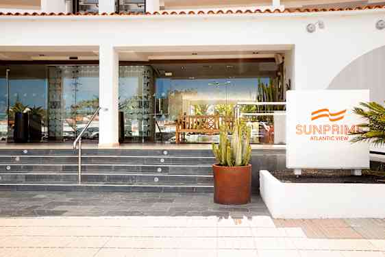 Infront of Sunprime Atlantic View with hotel sign
