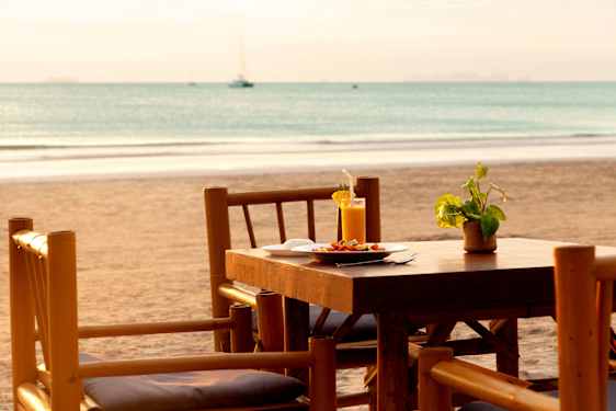 Beach restaurant in sunset