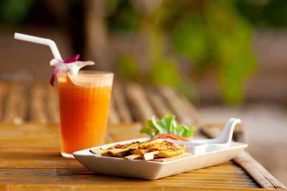 Satay and orange drink