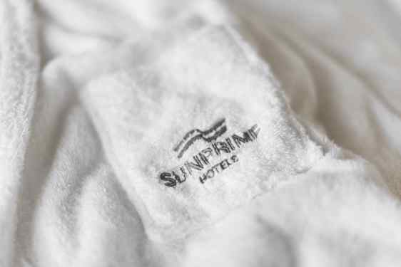 White robe with grey text