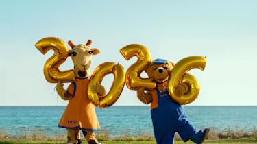 Lollo & Bernie holding balloons 2026